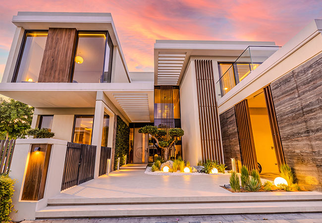 tilal al ghaf villa entrance at sunset